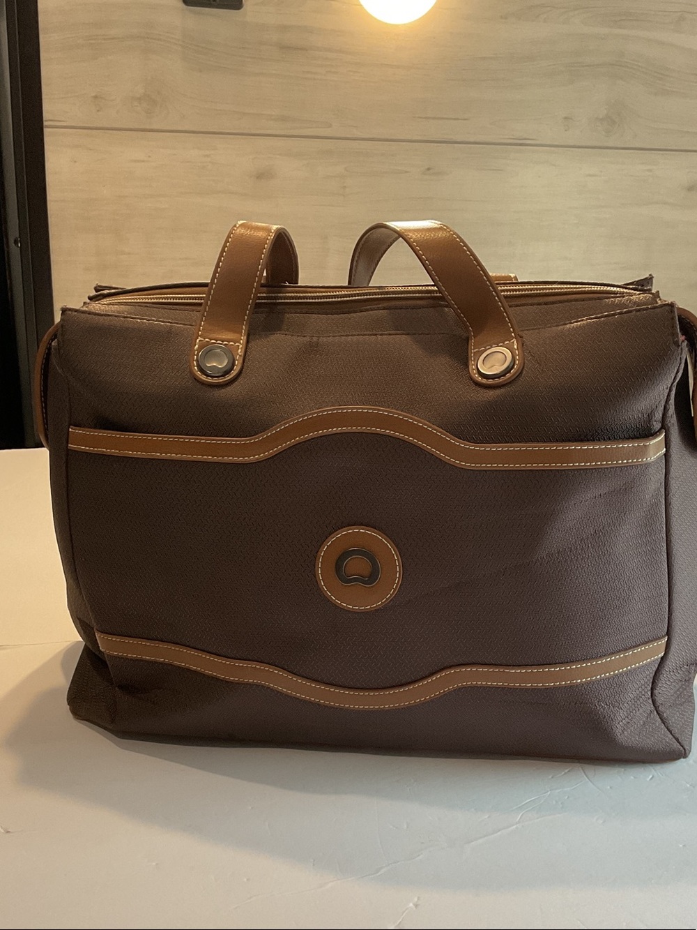 Delsey Brown Men's Duffel Bag with Tan Trim - Travel-Ready Carryall